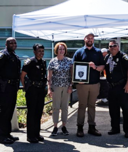 Seattle Mayor Durkan, SPD Chief Best and others with Marcus Johnson award July 2019